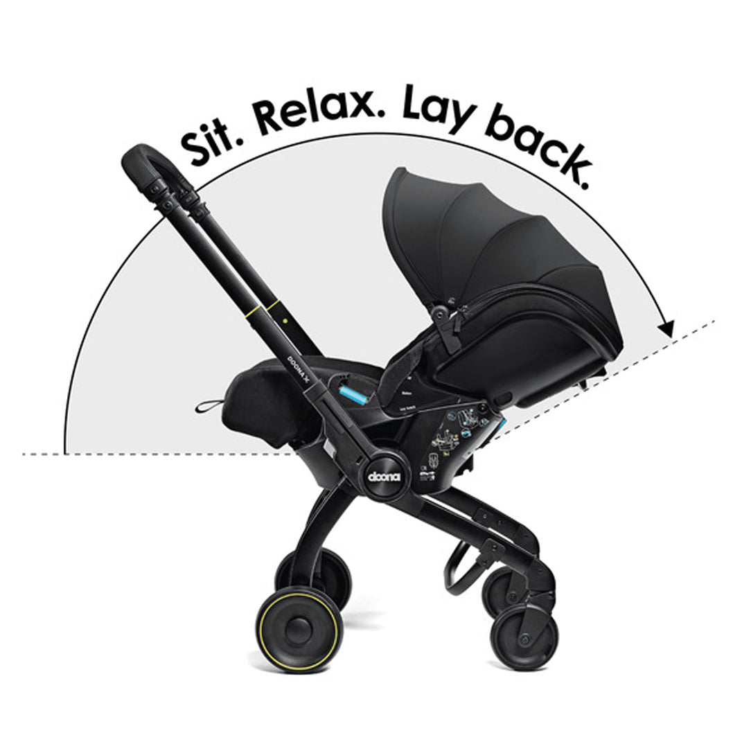 DOONA X Infant Car Seat - Nitro Black & Free Essentials Bag - Gold