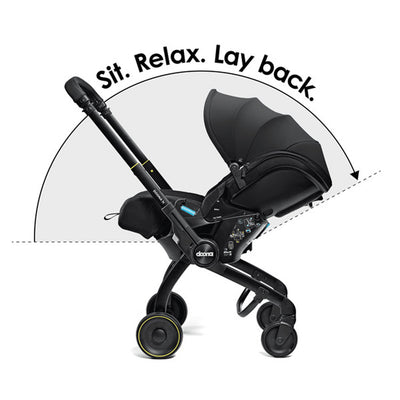 DOONA X Infant Car Seat - Nitro Black & Free Essentials Bag - Gold