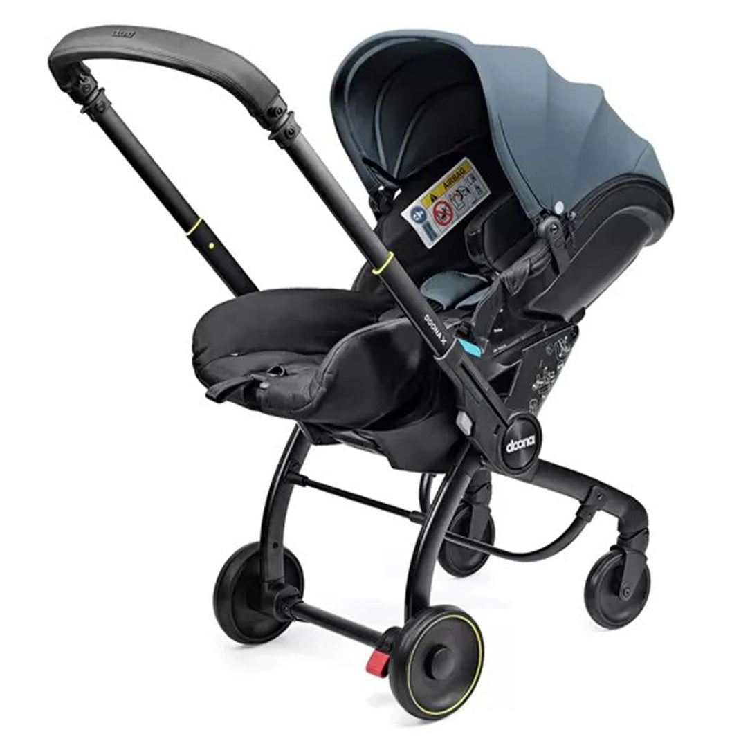 DOONA X Infant Car Seat - Ocean Blue & Free Essentials Bag - Gold