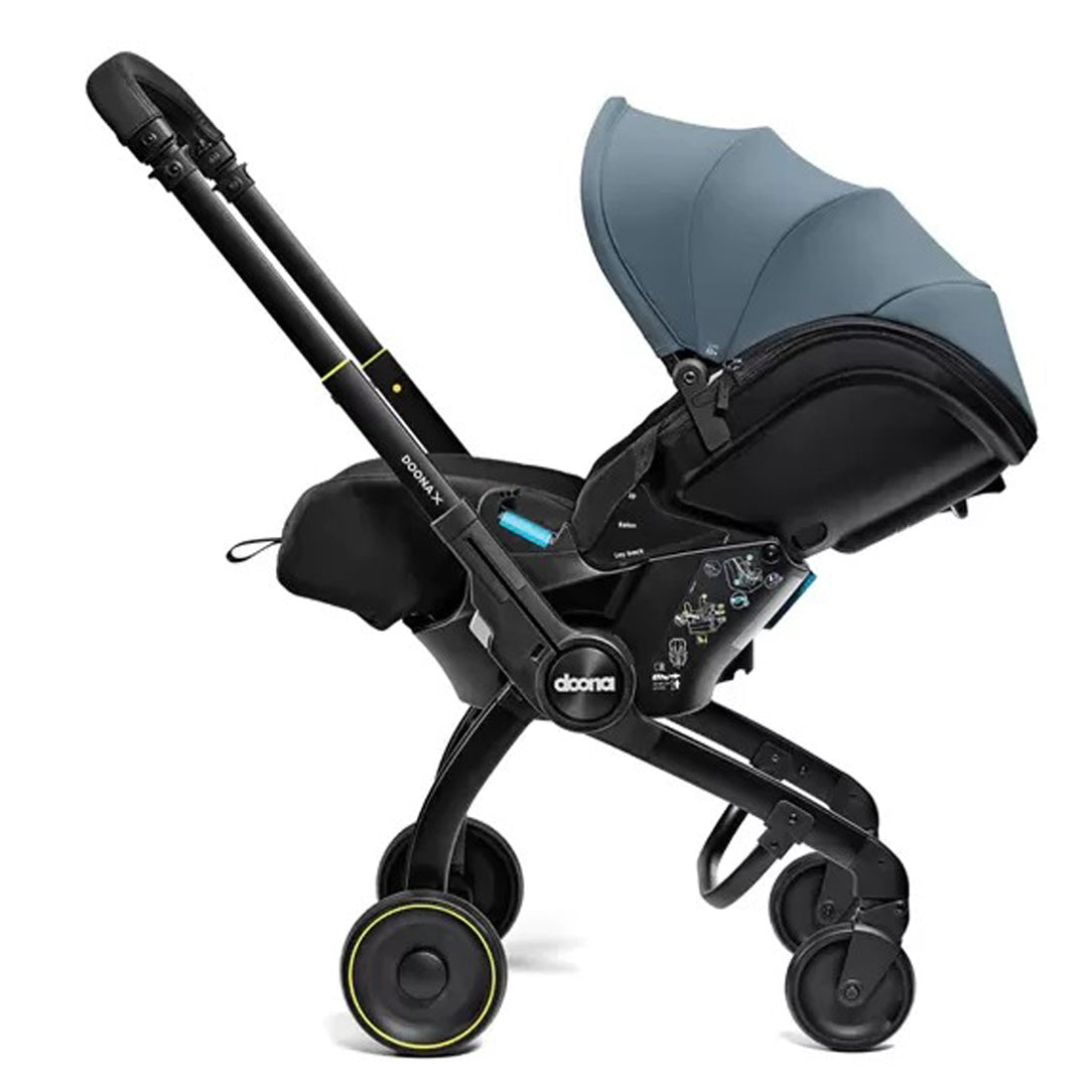 DOONA X Infant Car Seat - Ocean Blue & Free Essentials Bag - Gold