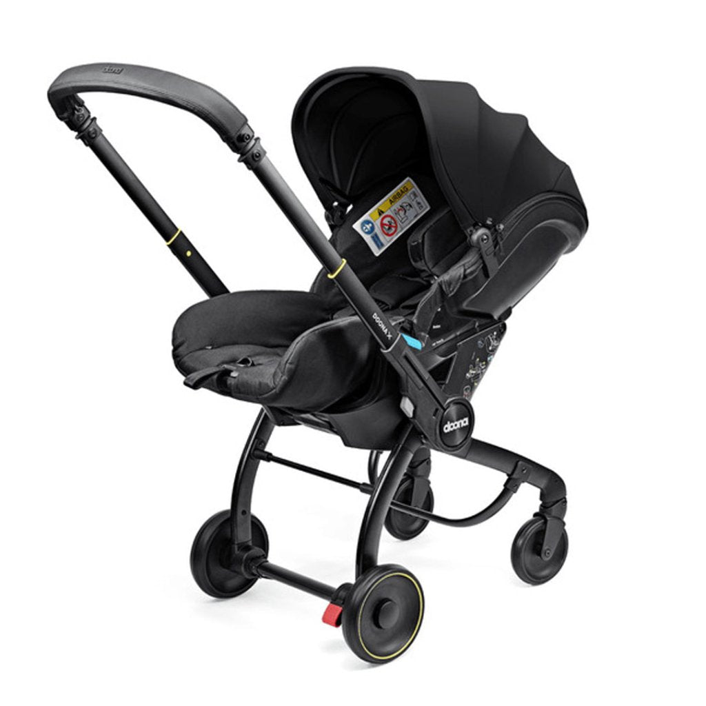 Bambinista - DOONA - Car Seats - DOONA X Infant Car Seat - Nitro Black & Free Essentials Bag - Gold