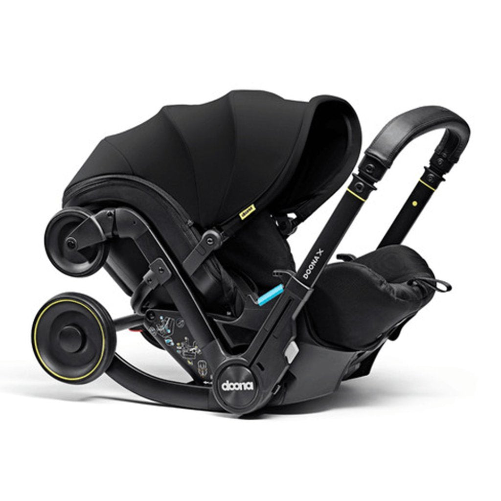 Bambinista - DOONA - Car Seats - DOONA X Infant Car Seat - Nitro Black & Free Essentials Bag - Gold